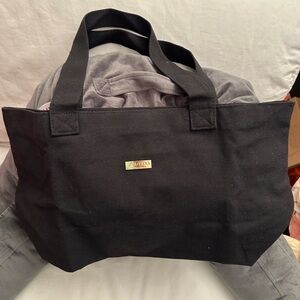Black shiseido Canvas Tote with 10ml serum